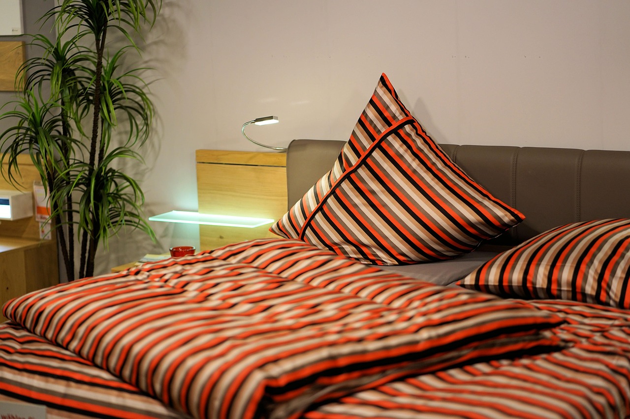 Linen-made hotel bed in soft coastal light